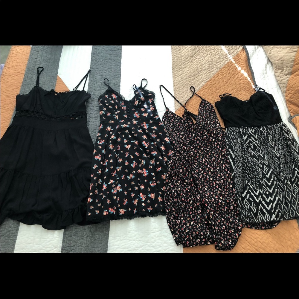 Black sundress bundle. 4 dresses. Black floral pattern. Size medium.